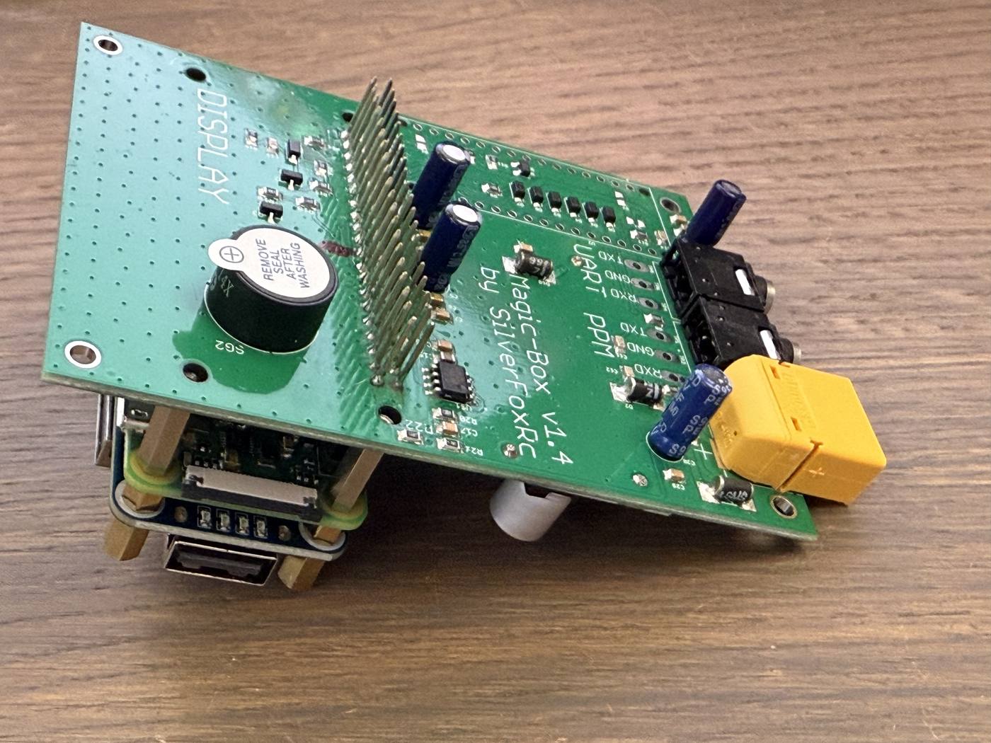 The mainboard in place on top of the Raspberry Pi and hub stack